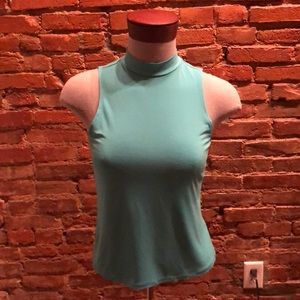 Bright blue high neck blouse